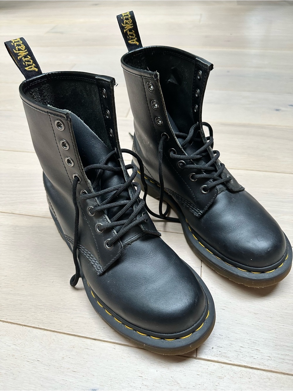 Dr. Martens Black Leather 8-Eye Lace-Up Boots with Yellow Stitching